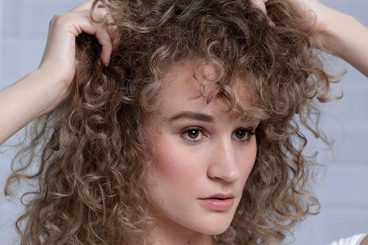 Top 5 Causes of Frizz-And How to Tame It