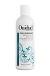 Bottle of Ouidad Curl Quencher® Moisturizing Shampoo on white background